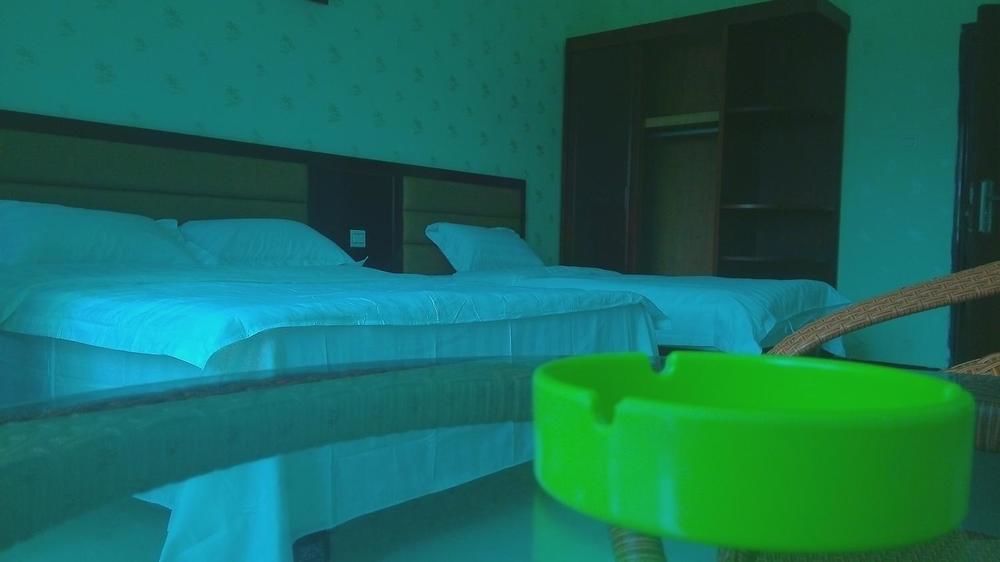 Ju Yuan Ge Hotel Szanja Kültér fotó